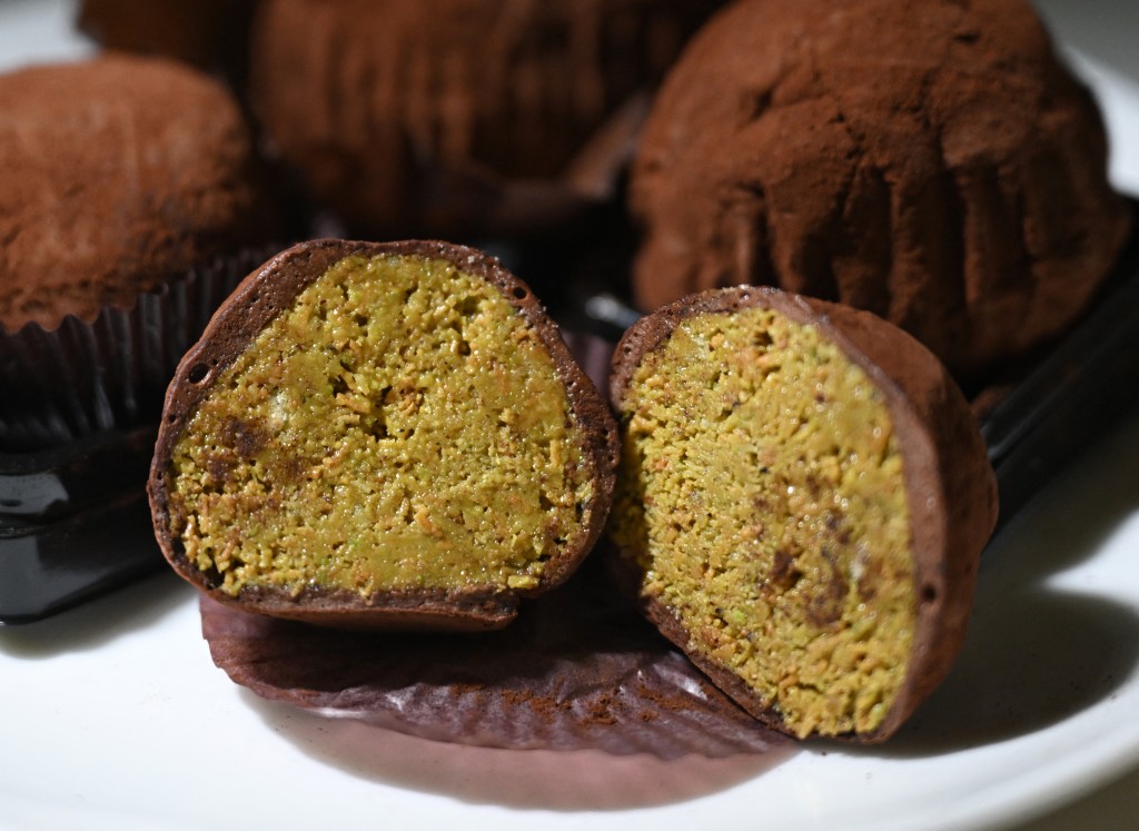 Photo by JUNG YEON-JE / AFP  This photo illustration taken in Seoul on January 20, 2026 shows a general view of plated "Dubai-style" chewy chocolate cookies.