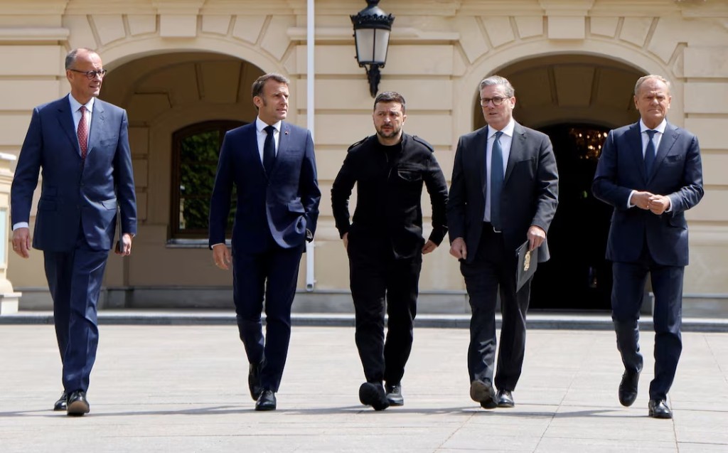 German Chancellor Friedrich Merz, French President Emmanuel Macron, Ukranian President Voloydmyr Zelensky, British Prime Minister Keir Starmer and Polish Prime Minister Donald Tusk walk in the grounds of the Mariynsky Palace, in Kyiv, Ukraine, May 10, 2025. Ludovic Marin/Pool via REUTERS/File Photo