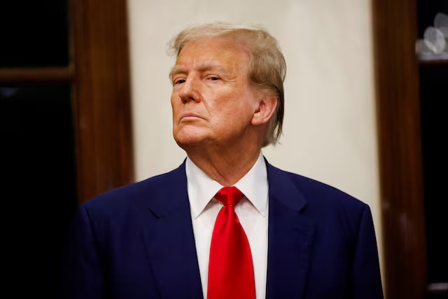 Republican presidential candidate and former U.S. President Donald Trump attends the 2024 Senior Club Championship award ceremony at his Trump International Golf Club in West Palm Beach, Florida, U.S. March 24, 2024. REUTERS/Marco Bello/ File Photo