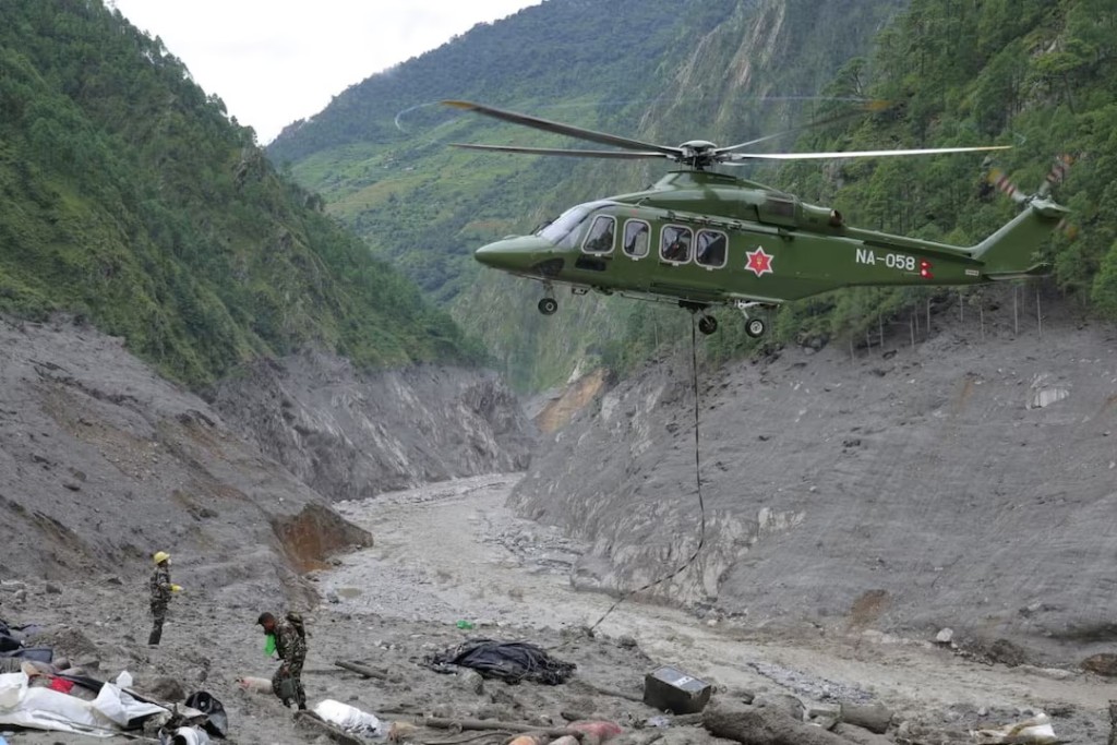 Nepal army soldiers work during a search and rescue operation outside a tunnel near the Hydropower Project sites, following deadly flash floods and mudslides, in Rasuwa district, Nepal, in this handout obtained by Reuters on September 2, 2026. Nepal Army/Handout via REUTERS