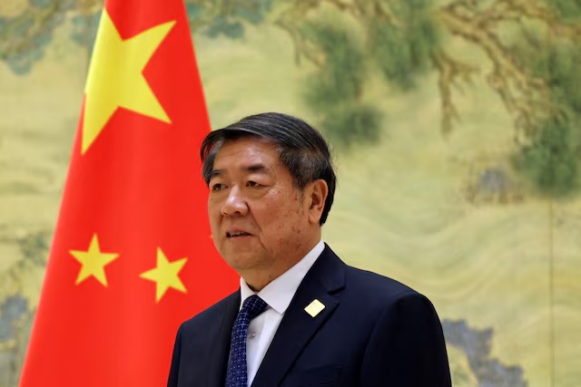 Chinese Vice Premier He Lifeng waits for a photo session with Britain's Chancellor of the Exchequer Rachel Reeves (not pictured) before the China-UK Financial Services Summit, at the Diaoyutai State Guesthouse in Beijing, China January 11, 2025. REUTERS/Florence Lo/File Photo