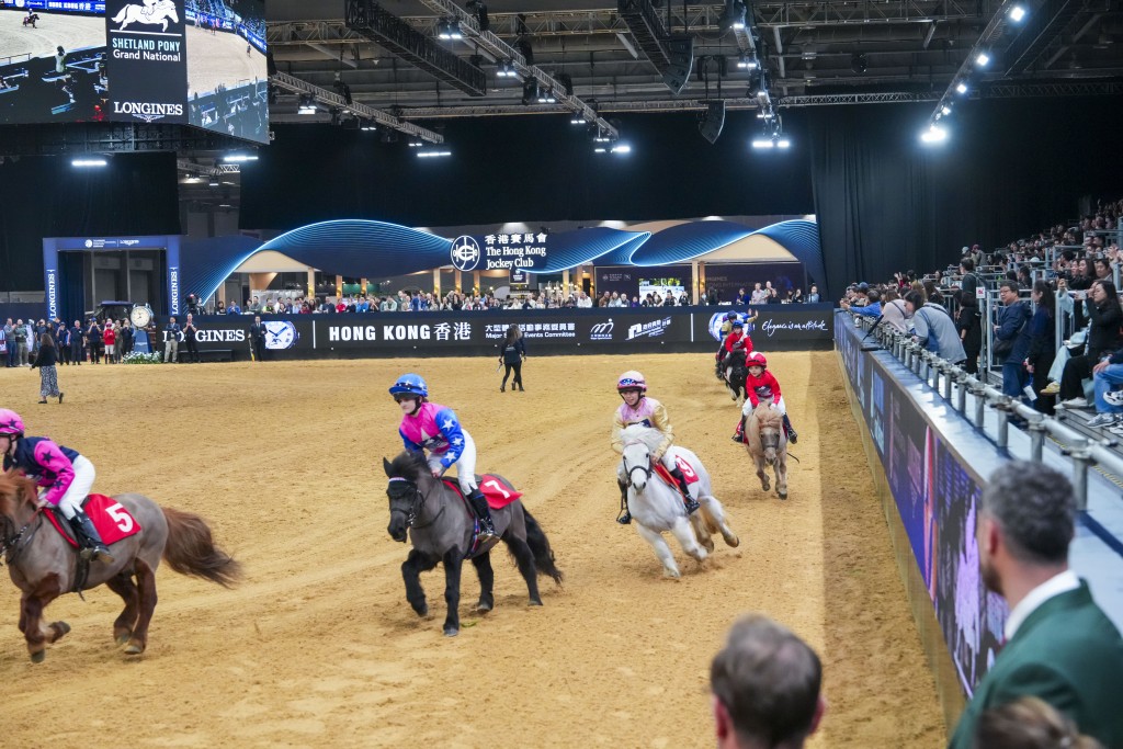 The popular Shetland Pony Grand National returned, featuring young riders and lively ponies racing across a specially designed miniature course.