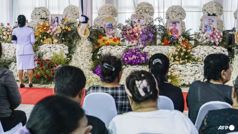 Mourners gather before prayers for the victims of a school bus fire near their coffins at Wat Khao Phraya Sangkharam School in Uthai Thani on Oct 3, 2024. (Photo: AFP/Chanakarn Laosarakham) Mourners gather before prayers for the victims of a school bus fire near their coffins at Wat Khao Phraya Sangkharam School in Uthai Thani on Oct 3, 2024. (Photo: AFP/Chanakarn Laosarakham)