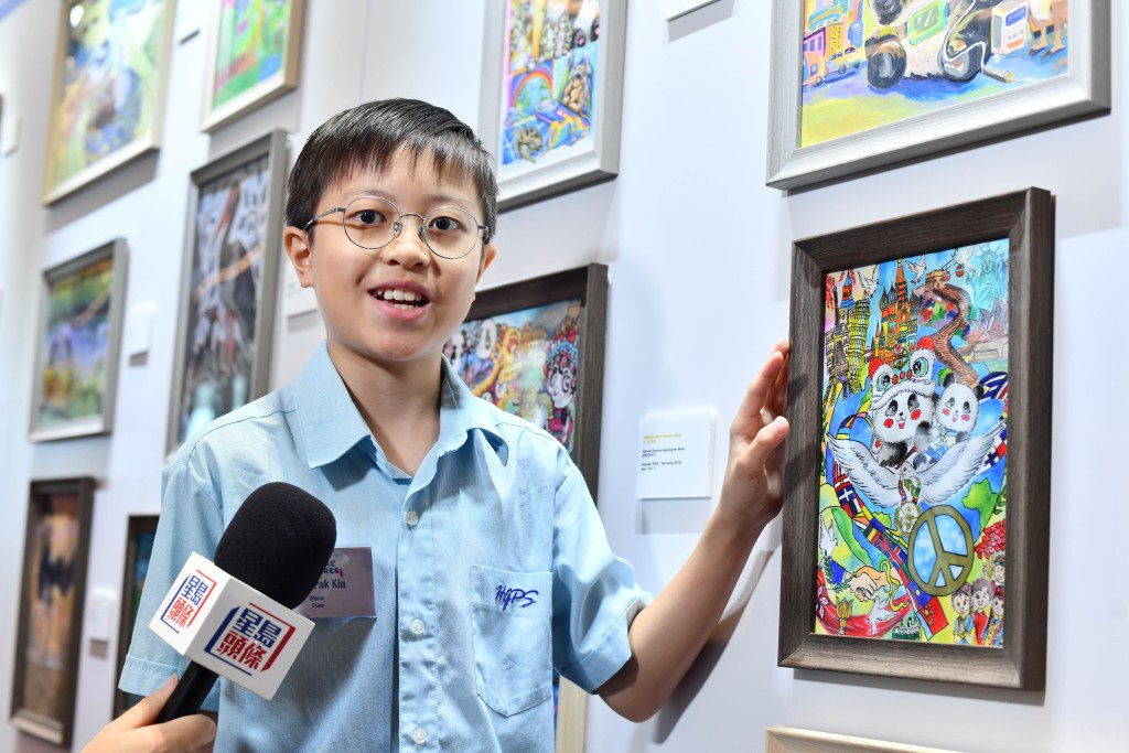Twelve-year-old Hong Kong student Wong Pak-kiu won China’s Children’s Bronze Award with a panda-themed artwork promoting peace. Twelve-year-old Hong Kong student Wong Pak-kiu won China’s Children’s Bronze Award with a panda-themed artwork promoting peace.