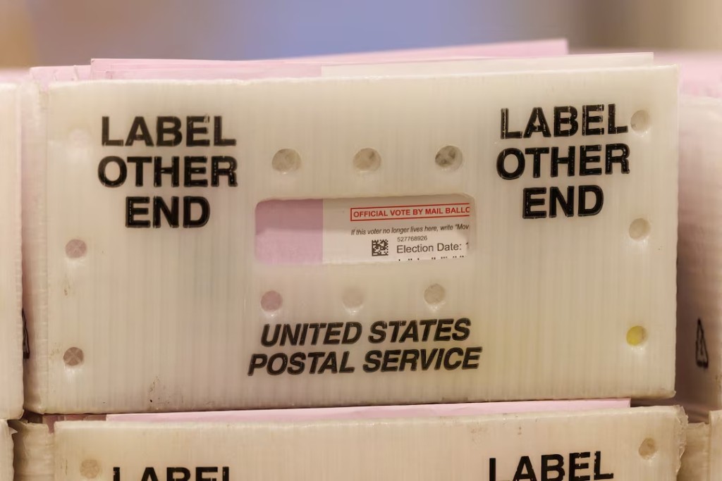 Mail-in ballots are shown in a U.S. postal box at the Los Angeles County Ballot Processing Center in the city of Industry, California, U.S. October 29, 2024. REUTERS/Mike Blake