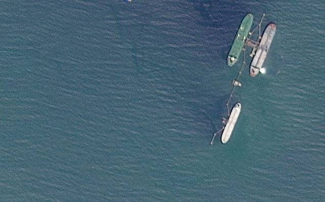 FILE PHOTO: A satellite image shows the very large crude carrier (VLCC) Skipper, which British maritime risk management group Vanguard said was believed to have been seized on December 10, as well as other vessels, off Port Jose, Venezuela, November 14, 2025. 2025 PLANET LABS PBC/Handout via REUTERS
