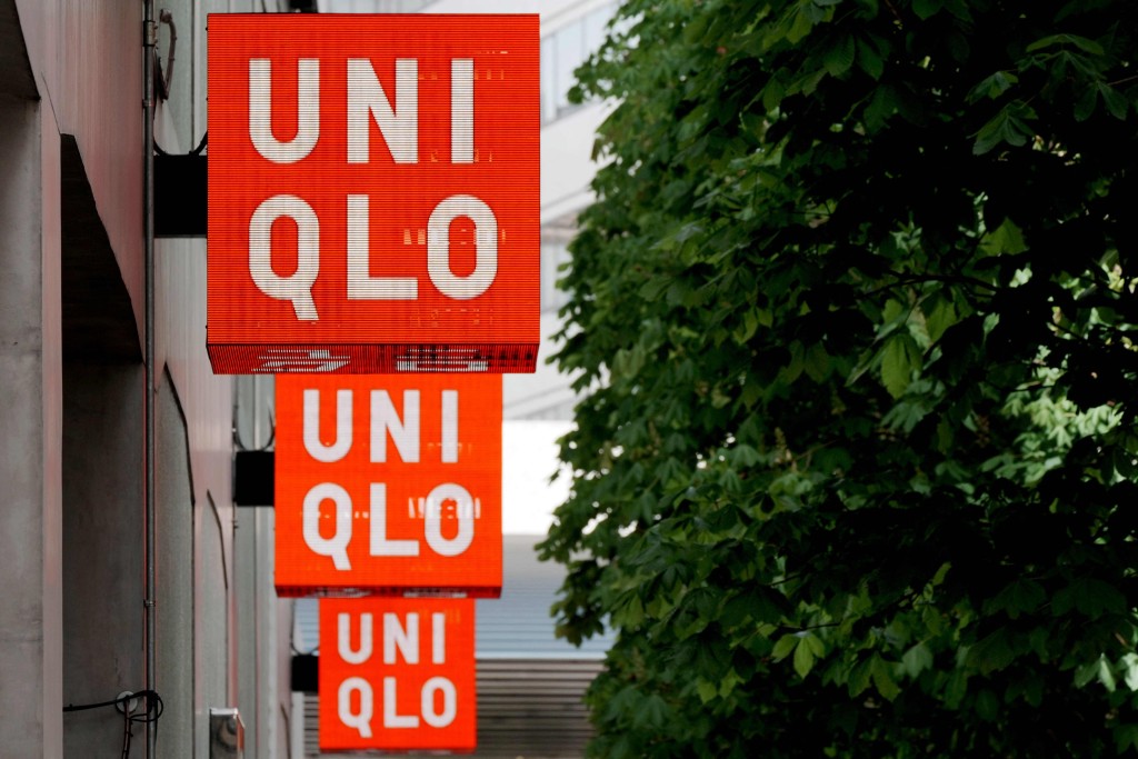 The logo of the Fast Retailing clothing brand Uniqlo is seen outside a branch in central Tokyo on April 9, 2026. AFP