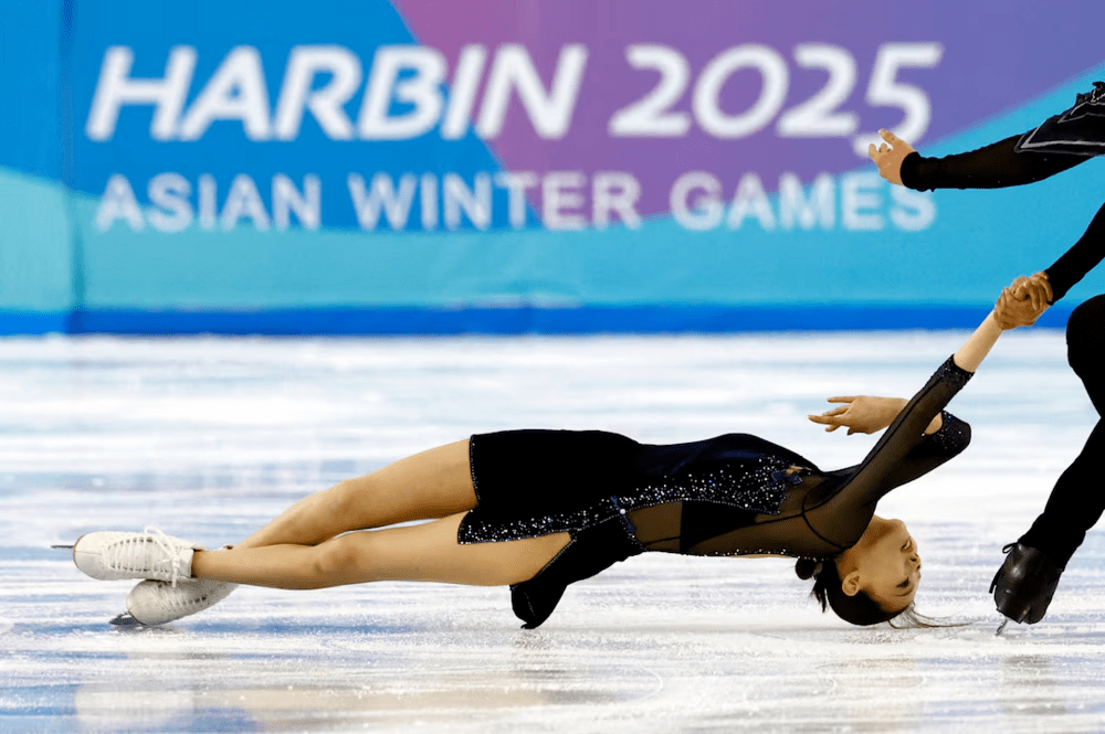 Harbin 2025 - Asian Winter Games - Figure Skating - Mixed Pair Skating Free Skating - HIC Multifunctional Hall, Harbin, China - February 12, 2025 China's Yuchen Wang and Lei Zhu perform during the Mixed Pair Skating Free Skating REUTERS/Issei Kato/File Photo Harbin 2025 - Asian Winter Games - Figure Skating - Mixed Pair Skating Free Skating - HIC Multifunctional Hall, Harbin, China - February 12, 2025 China's Yuchen Wang and Lei Zhu perform during the Mixed Pair Skating Free Skating REUTERS/Issei Kato/File Photo