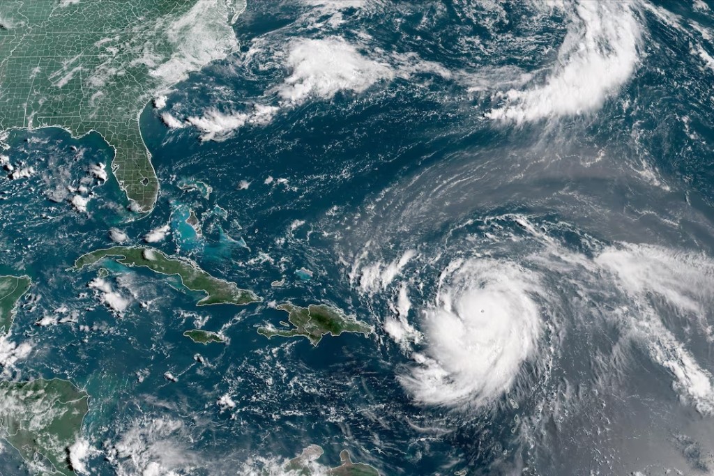 Hurricane Erin, which is the first hurricane of the 2025 Atlantic season and has developed into a dangerous Category 4 hurricane, moves westward near Puerto Rico in a composite satellite image August 16, 2025. (CIRA/NOAA/Handout via REUTERS)