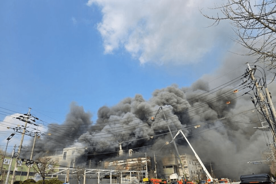 Smoke rises from at a car parts factory in Daejeon, South Korea, March 20, 2026. Yonhap via REUTERS