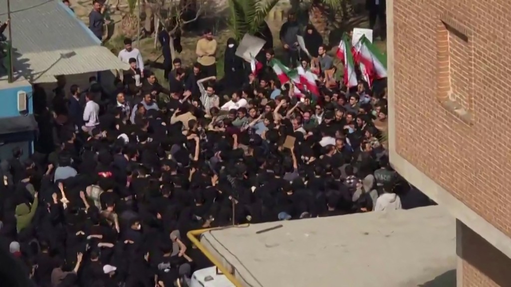 This video grab taken from UGC images posted on social media on February 22, 2026, and verified by AFPTV teams in Paris, shows Iranians clashing at the Amirkabir University of Technology in Tehran. (AFP)