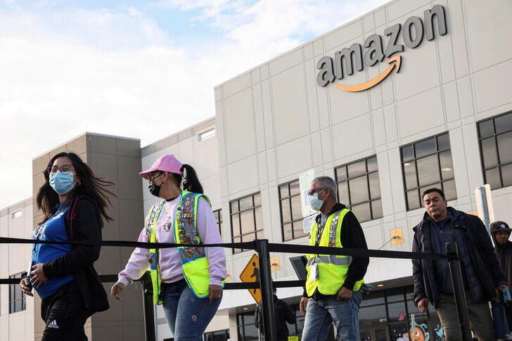 Workers stand in line to cast ballots for a union election at Amazon's JFK8 distribution center. (Reuters) Workers stand in line to cast ballots for a union election at Amazon's JFK8 distribution center. (Reuters)