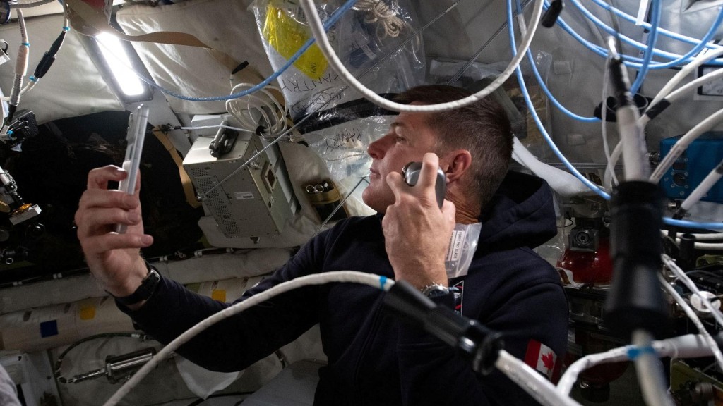 Artemis II mission specialist and CSA astronaut Jeremy Hansen enjoys a shave inside the Orion spacecraft. Reuters