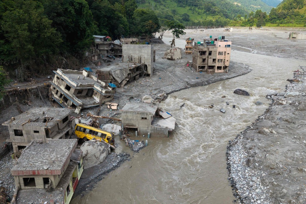 Flash floods and landslides hit the Nepal-Tibet border. AFP