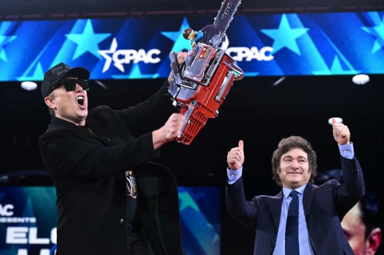 Elon Musk (L) wields a chainsaw alongside Argentine President Javier Milei during the annual Conservative Political Action Conference (CPAC) outside Washington on February 20, 2025. (AFP) Elon Musk (L) wields a chainsaw alongside Argentine President Javier Milei during the annual Conservative Political Action Conference (CPAC) outside Washington on February 20, 2025. (AFP)