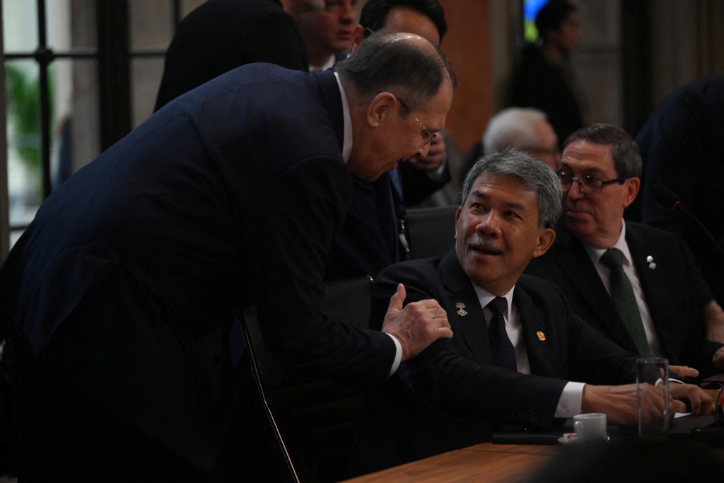 Malaysian Foreign Minister Mohamad bin Hasan speaks to Russian Foreign Minister Sergey Lavrov during the BRICS Foreign Ministers Meeting in Rio de Janeiro, Brazil April 29, 2025. (Reuters)