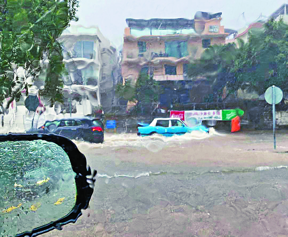 Lantau was one of the worst-hit areas during the deluge, with vehicles forced to wade through flooded roads and a work crew sent to clear a landslide that blocked South Lantau Road, while people elsewhere had to put up with intermittent showers. Lantau was one of the worst-hit areas during the deluge, with vehicles forced to wade through flooded roads and a work crew sent to clear a landslide that blocked South Lantau Road, while people elsewhere had to put up with intermittent showers.