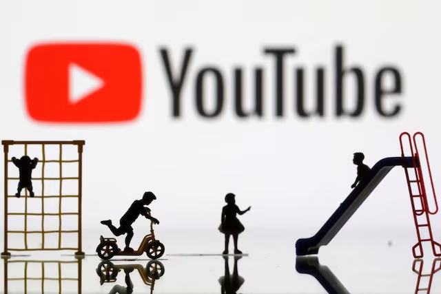 Children playground miniatures are seen in front of displayed Youtube logo in this illustration taken April 4, 2023. REUTERS/Dado Ruvic/Illustration