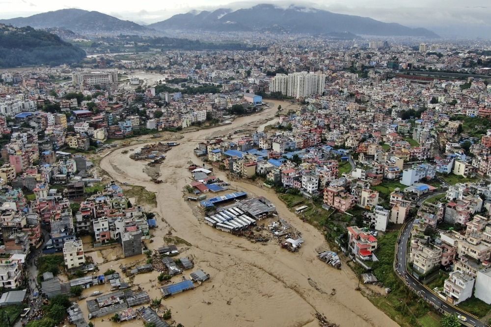 In this aerial image of the Kathmandu valley, Bagmati River is seen flooded due to heavy rains in Kathmandu, Nepal, Saturday, Sept. 28, 2024. (AP) In this aerial image of the Kathmandu valley, Bagmati River is seen flooded due to heavy rains in Kathmandu, Nepal, Saturday, Sept. 28, 2024. (AP)