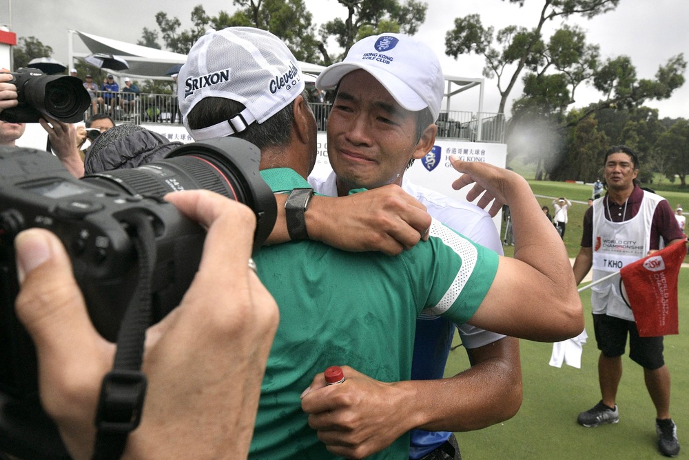 Tears and smiles after Taichi Ko wraps up victory at the World City Championship – the first international golf event in the city for three years.  SING TAO