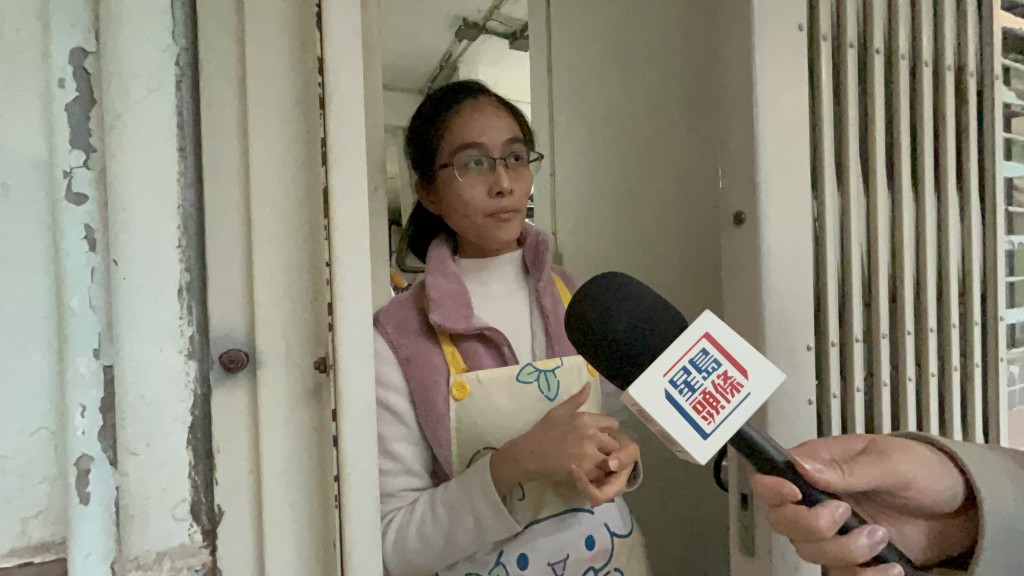 Ms Lo, a 20-year resident, supports redevelopment
