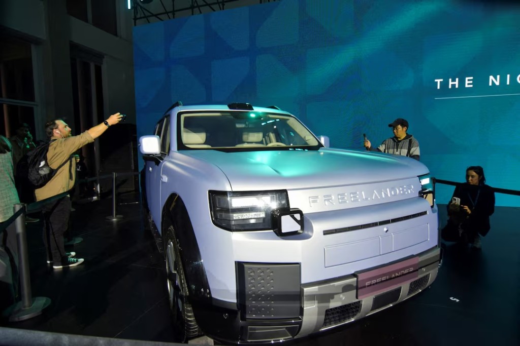 The Freelander 8, the first Freelander-branded electric vehicle jointly developed by British luxury automaker Jaguar Land Rover and Chinese joint-venture partner Chery is displayed at a launch event in Wuhu, China, April 25, 2026. REUTERS/Nick Carey/File Photo 