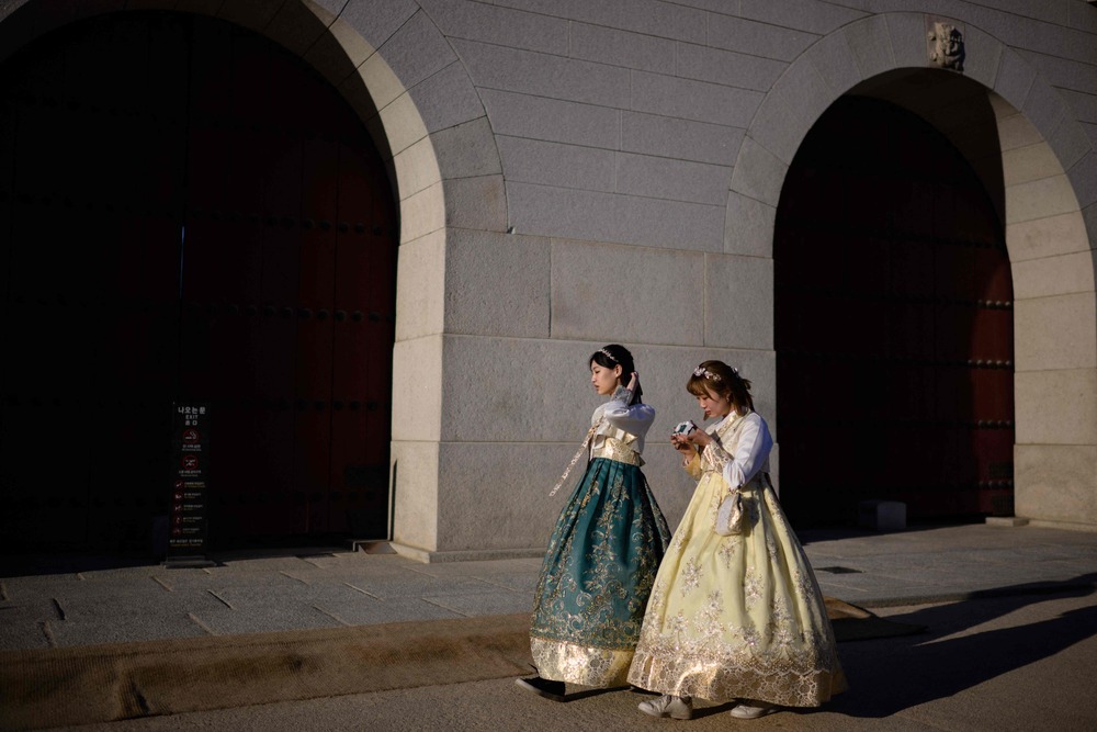 Two women visit Gyeongbokgung Palace in Seoul. South Korea has been struggling to boost its economy. AFP Two women visit Gyeongbokgung Palace in Seoul. South Korea has been struggling to boost its economy. AFP