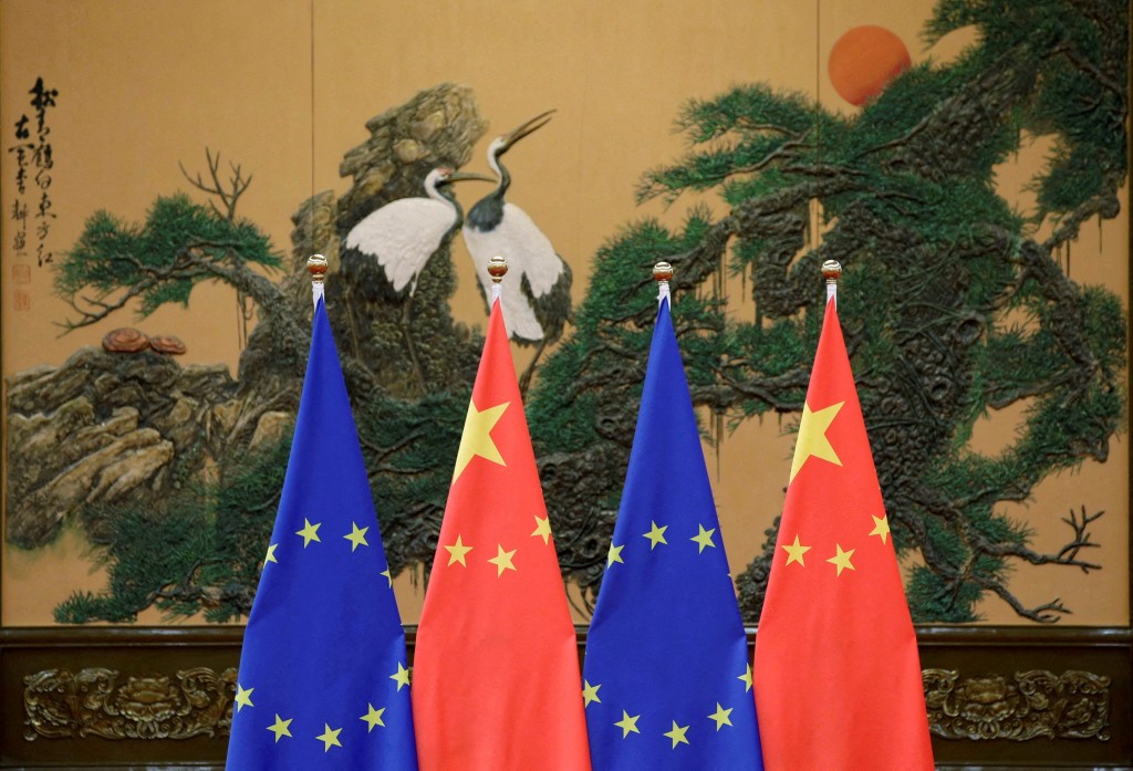 Flags of the European Union and China are pictured during the China-EU summit at the Great Hall of the People in Beijing, China, July 12, 2016. REUTERS/Jason Lee/File Photo  