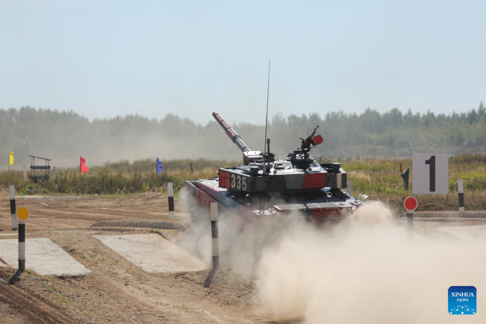 The Chinese team on Wednesday advanced to the tank biathlon's final contest in the ongoing International Army Games 2022 held in Russia. (Photo by Luo Kun/Xinhua) The Chinese team on Wednesday advanced to the tank biathlon's final contest in the ongoing International Army Games 2022 held in Russia. (Photo by Luo Kun/Xinhua)