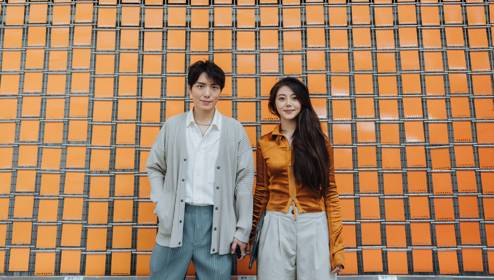 Leslie Fok and Frances Minji at the wind-activated kinetic wall.