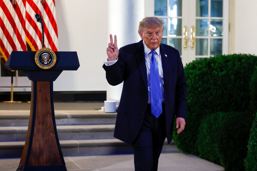 U.S. President Donald Trump leaves the podium after speaking as he hosts a dinner in the Rose Garden at the White House on September 02, 2026 in Washington, DC. President Trump invited Republicans in competitive races to a Rose Garden dinner ahead of the November elections. Kevin Dietsch/Getty Images/AFP