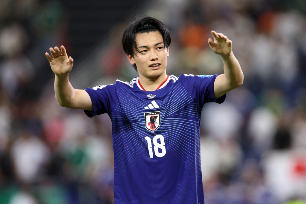Japan's forward #18 Ayase Ueda, who scored two goals, waves to fans at the end of the 2026 World Cup Group F football match between Tunisia and Japan (AFP)