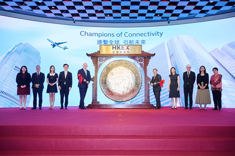 From fourth left, Ronald Lam Siu-por, Cathay Group chief executive, Guy Bradley, Carlson Tong, and Bonnie Chan Yi-ting, HKEX CEO.
