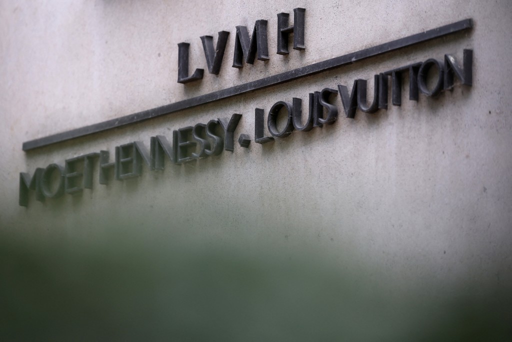 The logo of LVMH Moet Hennessy Louis Vuitton is seen in front of the LVMH luxury group headquarters in Paris, France, April 14, 2025. REUTERS/Sarah Meyssonnier