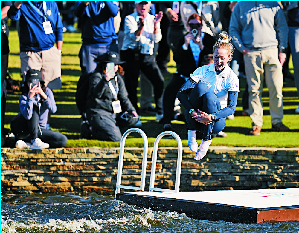 Nelly Korda jumps into the lake to celebrate her victory at the Chevron Championship. AP Nelly Korda jumps into the lake to celebrate her victory at the Chevron Championship. AP