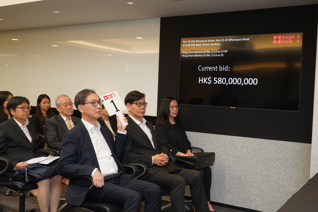 Augustine Wong Ho-ming, executive director of Henderson Land, attends the compulsory auction on Thursday.