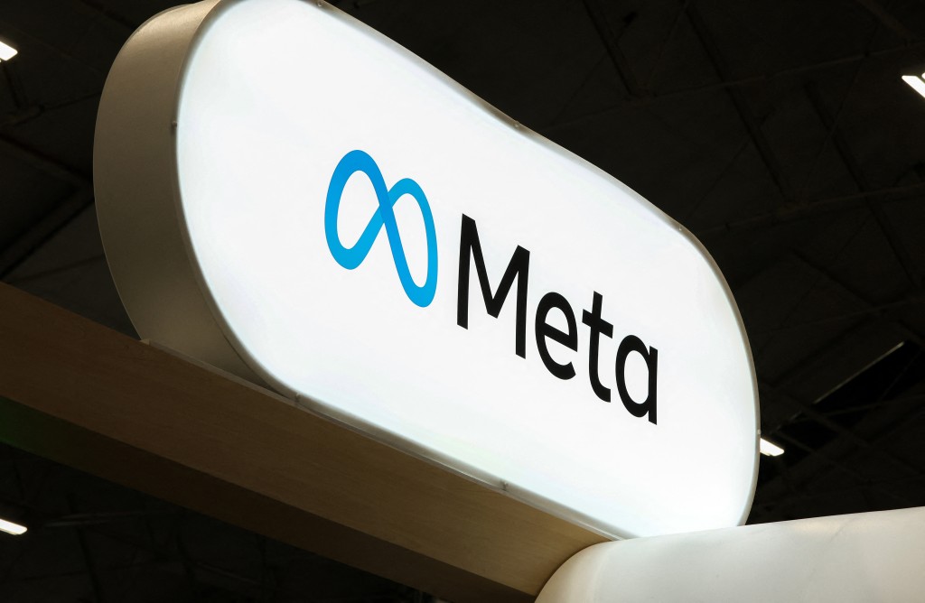 A Meta logo is pictured during the International AI Summit in Dublin, on October 14, 2026. (Photo by Paul Faith / AFP)