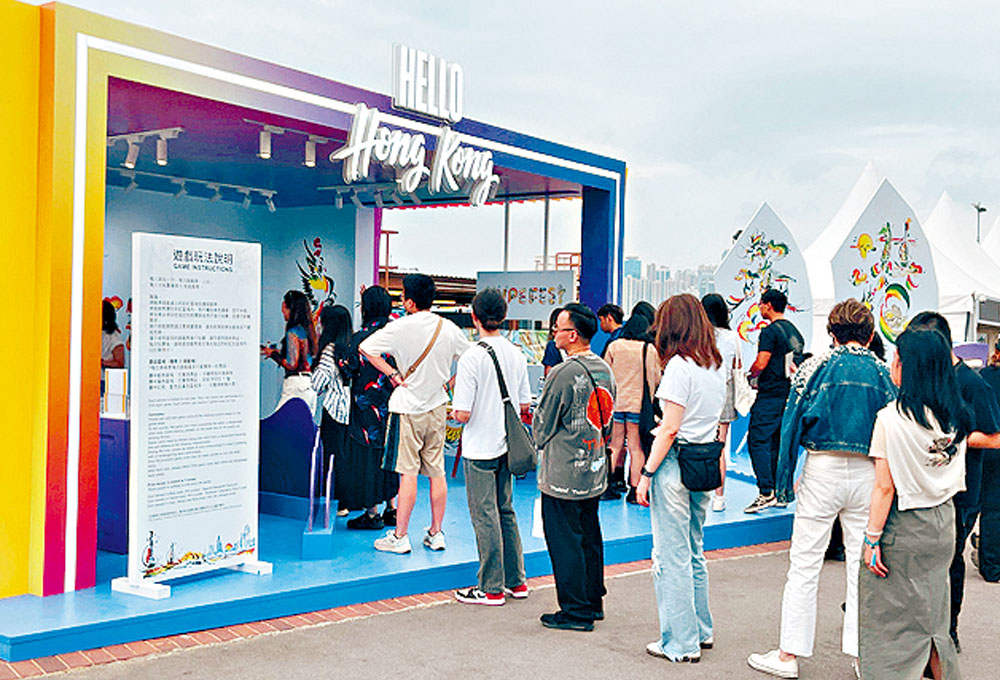 HKTB's "Hello Hong Kong" booth features Hong Kong’s east-meets-west  uniqueness by combining urban elements with Chinese calligraphy