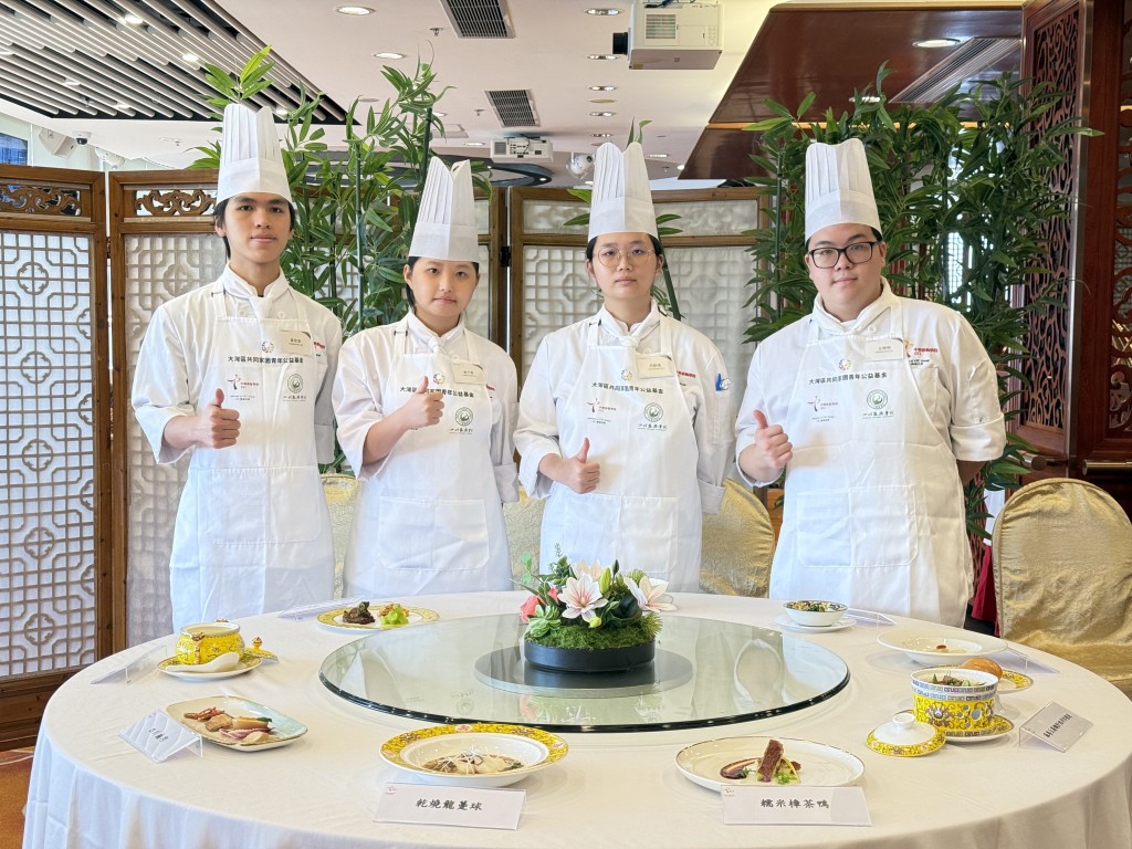Students shared the dishes they prepared for the graduation dinner.