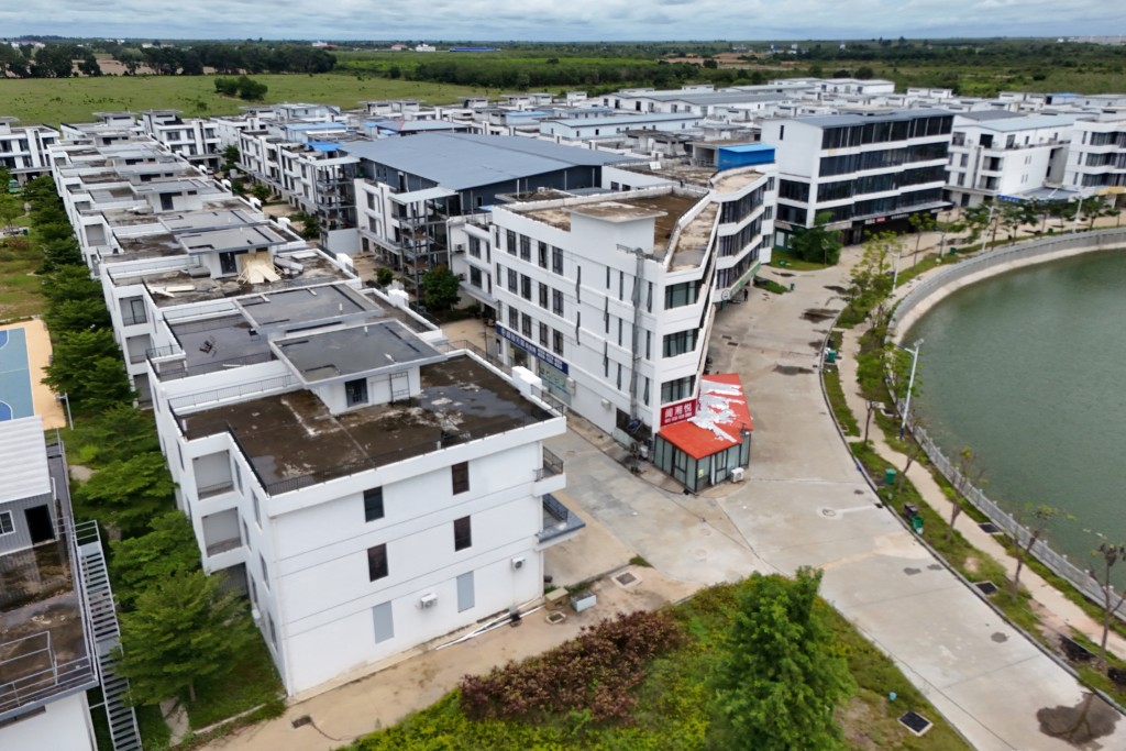 Photo by SUY SE / AFP  An aerial view shows a closed cyber scam centre compound in Cambodia's Prey Veng province on September 21, 2026.