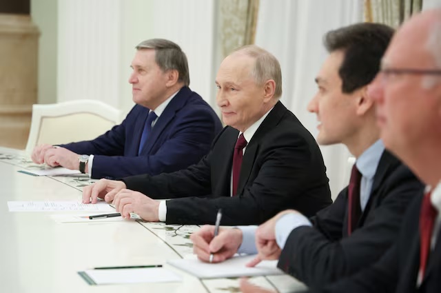Members of the Russian delegation, led by President Vladimir Putin, attend a meeting with U.S. President Donald Trump's special envoy Steve Witkoff and son-in-law Jared Kushner at the Kremlin in Moscow, Russia, December 2, 2025. Sputnik/Alexander Kazakov/Pool via REUTERS