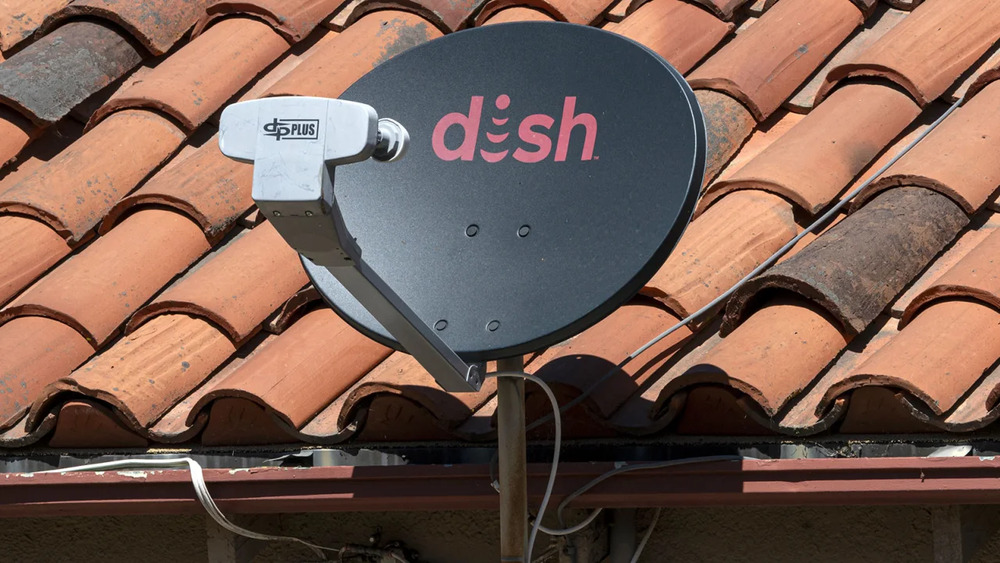 Dish Network is the first company to be fined by the FCC for improper satellite disposal. One of the company's satellite dishes is seen on the roof of a home in Crockett, California, on July 31. (Bloomberg) Dish Network is the first company to be fined by the FCC for improper satellite disposal. One of the company's satellite dishes is seen on the roof of a home in Crockett, California, on July 31. (Bloomberg)