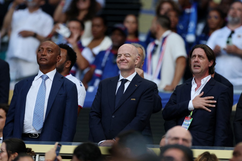President of the Confederation of African Football Patrice Motsepe, FIFA President Gianni Infantino and the Ppresident of the Uruguayan Football Association Ignacio Alonso are seen ahead of the 2026 World Cup Group H football match between Uruguay and Cape Verde (AFP)