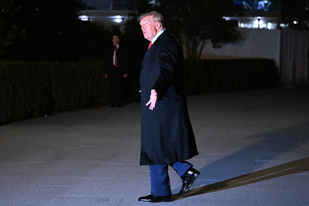 US President Donald Trump walks to the White House after arriving on Marine One at the South Lawn in Washington, DC, on October 10, 2026. (AFP)