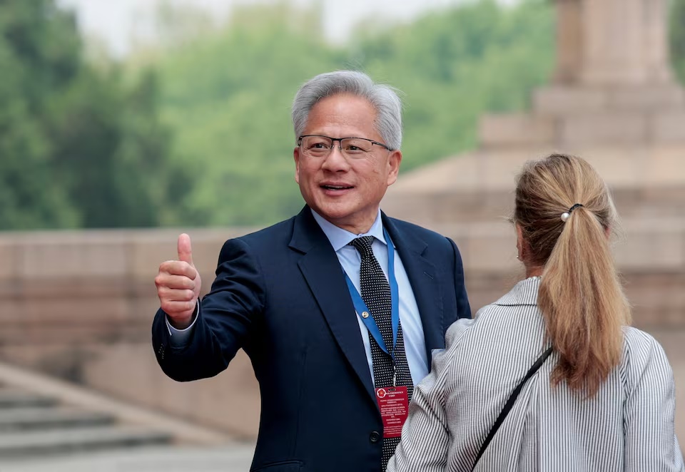 Jensen Huang, Founder, President and CEO of Nvidia gestures as he leaves after attending a welcome ceremony for U.S. President Donald Trump with Chinese President Xi Jinping at the Great Hall of the People in Beijing, China, May 14, 2026. REUTERS/Evan Vucci
