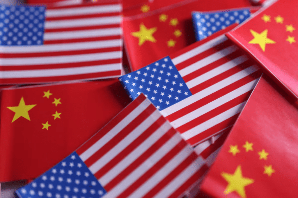 U.S. and Chinese flags are seen in this illustration taken March 20, 2025. REUTERS/Dado Ruvic/Illustration