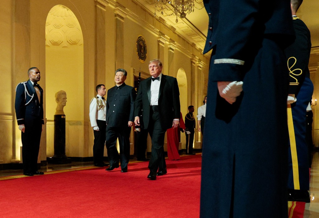 US President Donald Trump and Chinese President Xi Jinping walk at the White House on the day of a state dinner in Washington, D.C., US, September 24, 2026. REUTERS/Evelyn Hockstein