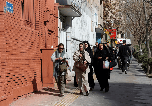 People run for cover following an explosion, after Israel said it launched a pre-emptive attack against Iran, in Tehran, Iran, February 28. Majid Asgaripour/WANA (West Asia News Agency) via REUTERS