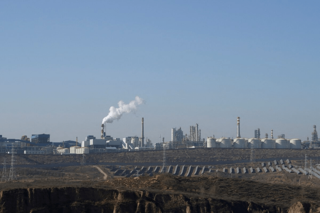Solar panels lie in front of factories at Jinjie Industrial Park in Shenmu, Shaanxi province, China November 20, 2023. REUTERS/Colleen Howe/File Photo