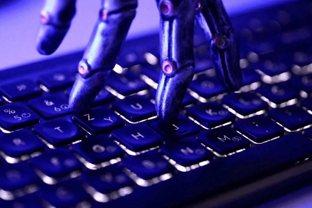 A keyboard and a robotic hand in this illustration taken June 5, 2026. REUTERS/Dado Ruvic/Illustration/File Photo